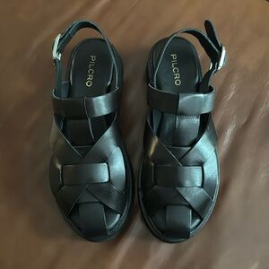 Anthropologie’s Pilcro Flatform Fisherman Sandal.